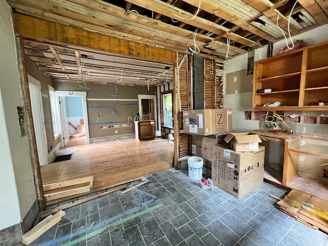 miscellaneous room featuring dark hardwood / wood-style floors