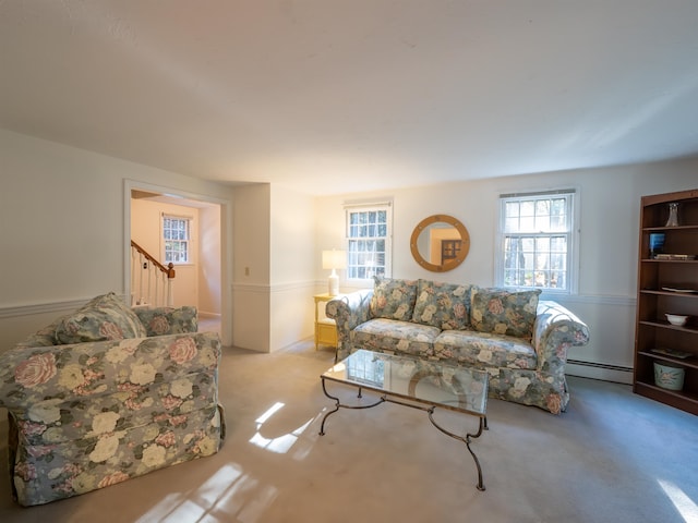 living room with light colored carpet and a baseboard radiator