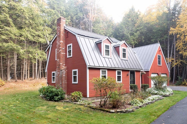 view of home's exterior featuring a lawn