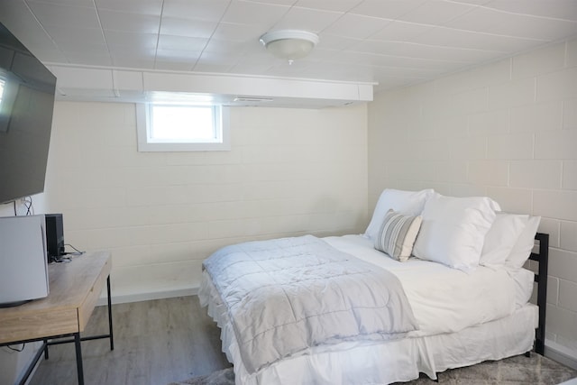 bedroom featuring hardwood / wood-style flooring