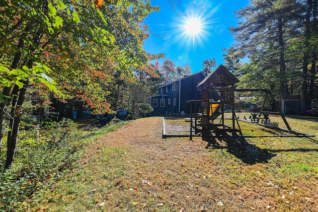 view of yard featuring a playground