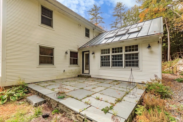 rear view of property with a patio area