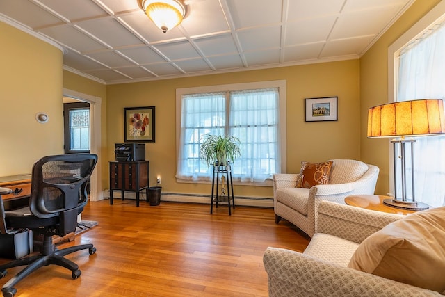 home office featuring wood-type flooring and baseboard heating