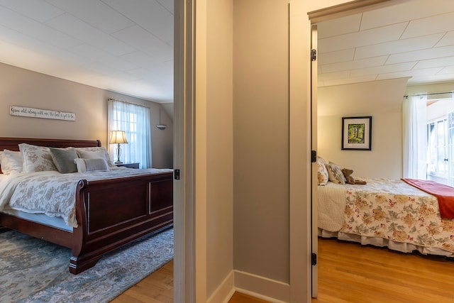 bedroom featuring hardwood / wood-style floors