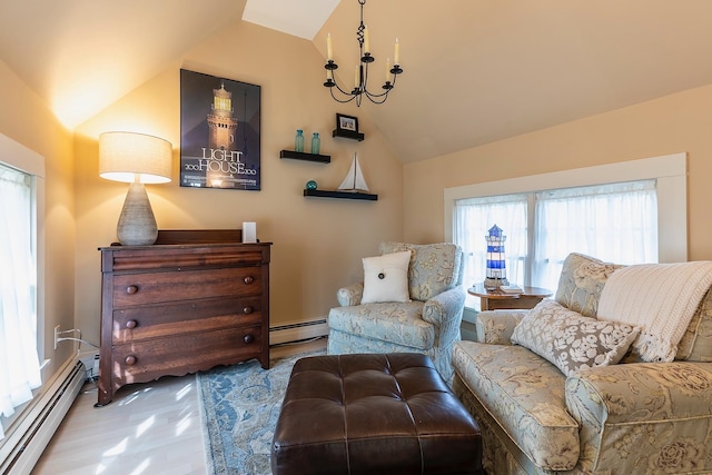 sitting room with hardwood / wood-style floors, vaulted ceiling, and baseboard heating