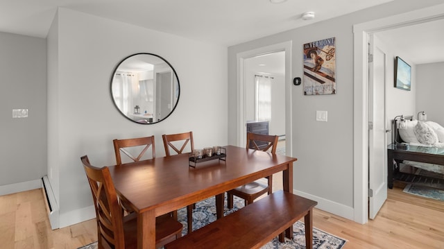 dining room with light hardwood / wood-style floors