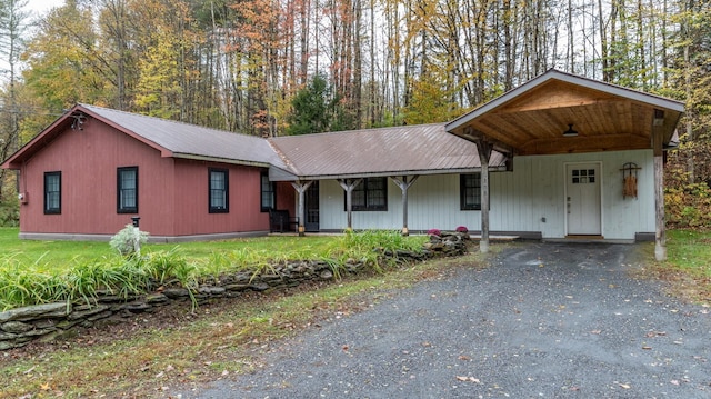 ranch-style house with a carport