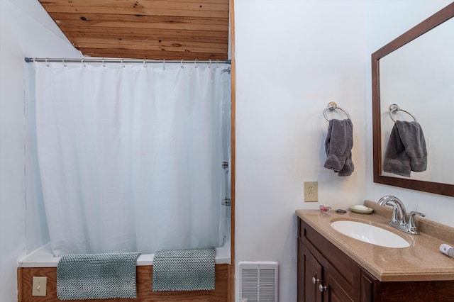 bathroom featuring vanity, wood ceiling, and shower / bathtub combination with curtain