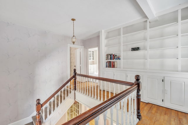 corridor featuring hardwood / wood-style floors