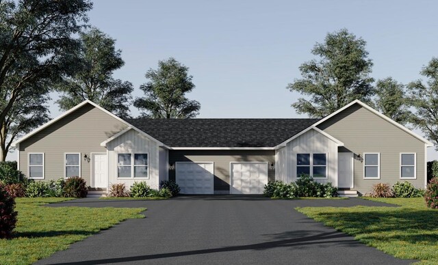 ranch-style house with a front lawn and a garage