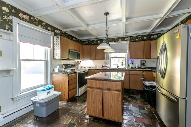 kitchen with coffered ceiling, dark countertops, electric stove, black microwave, and stainless steel fridge