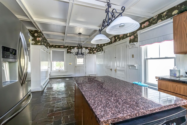 kitchen featuring stone tile floors, a chandelier, coffered ceiling, baseboard heating, and stainless steel refrigerator with ice dispenser