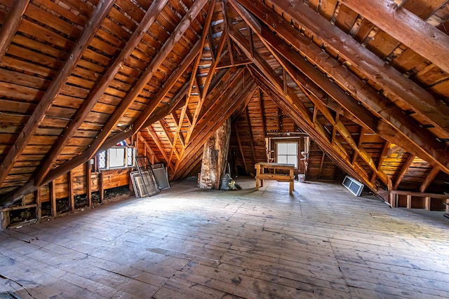 unfinished attic with a wealth of natural light