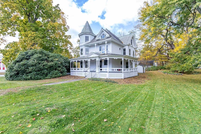 victorian home with a front lawn and a porch