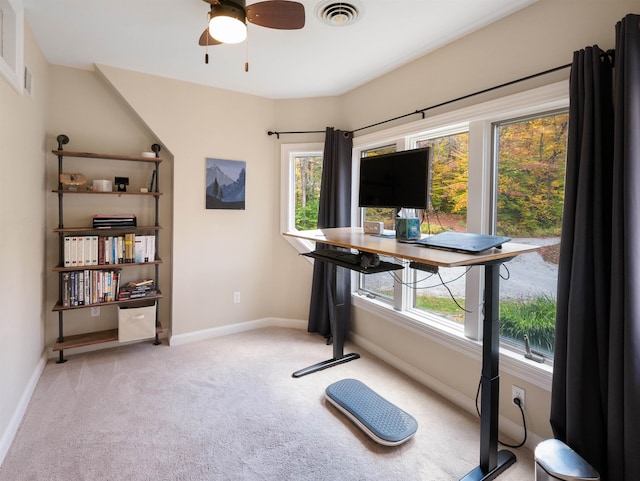 office featuring light carpet and ceiling fan