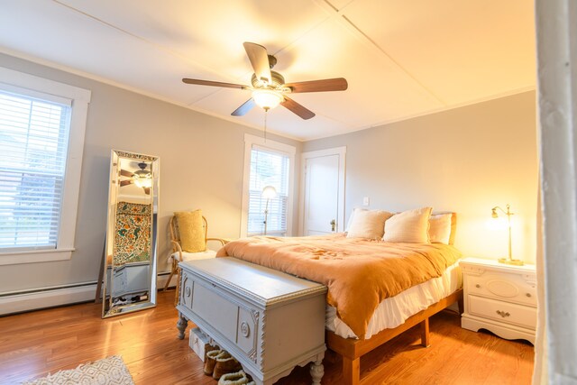 bedroom featuring ceiling fan and light wood-type flooring