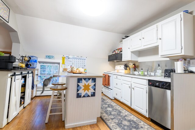 kitchen featuring light hardwood / wood-style floors, a breakfast bar, dishwasher, white electric range oven, and white cabinetry