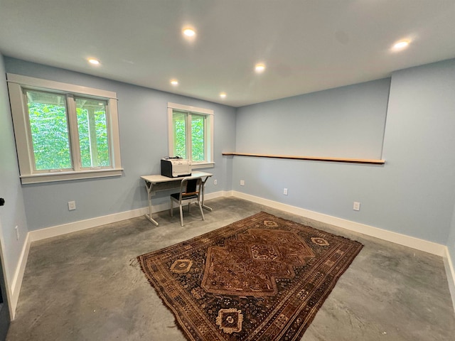 home office with concrete floors