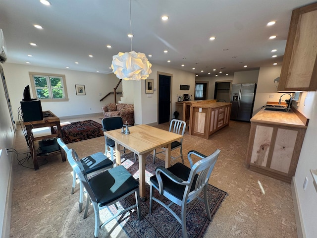 dining space with sink