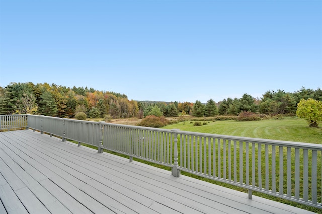 deck featuring a lawn