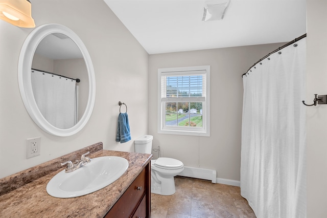 bathroom featuring vanity, a baseboard radiator, tile patterned flooring, and toilet