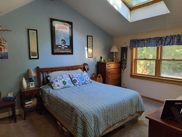 bedroom featuring lofted ceiling with skylight and carpet