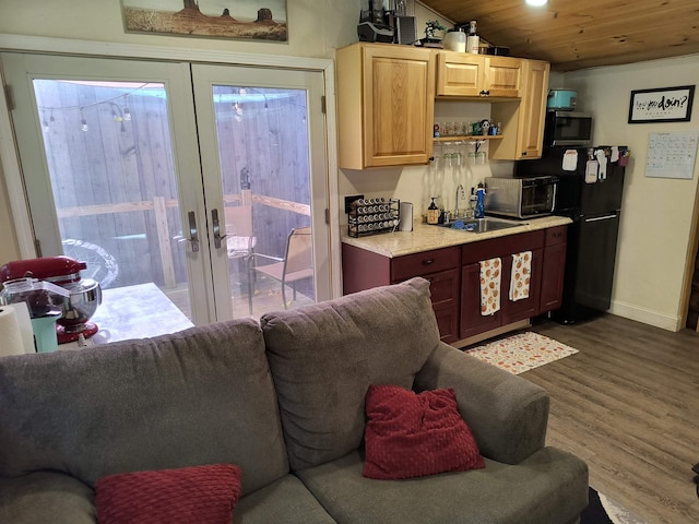 kitchen with dark wood-type flooring, french doors, wood ceiling, and vaulted ceiling