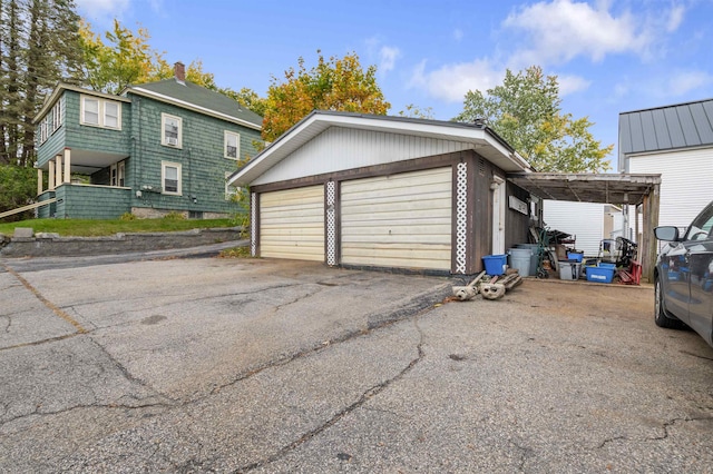 view of property exterior featuring a garage