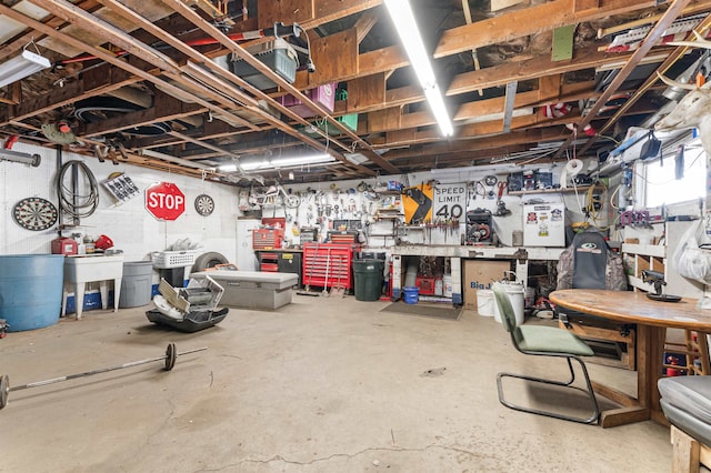 basement with a workshop area