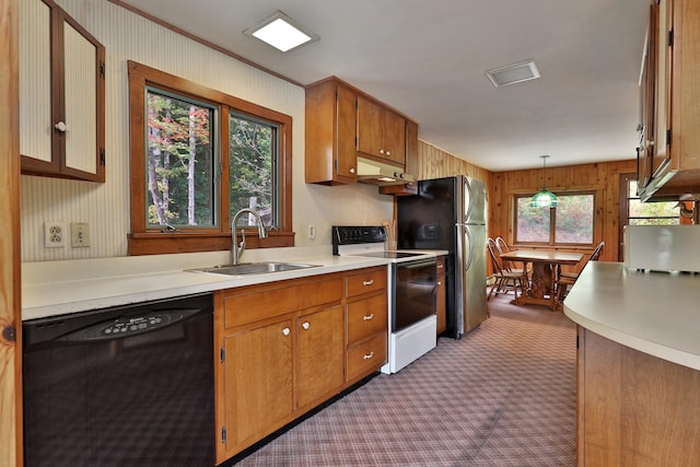 kitchen with pendant lighting, dark carpet, sink, dishwasher, and white electric range oven