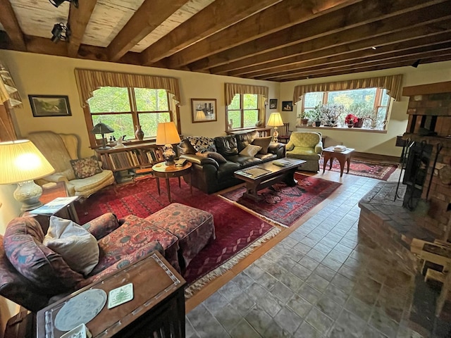 tiled living room with beamed ceiling