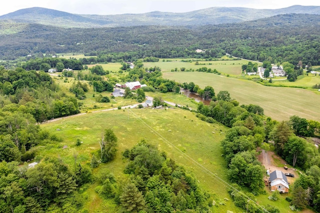 aerial view with a mountain view and a rural view