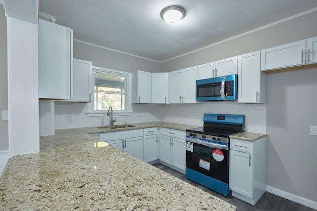 kitchen featuring light stone countertops, white cabinets, sink, ornamental molding, and electric range