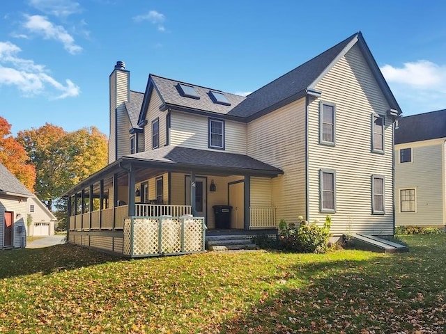 view of front of home featuring a front lawn and covered porch