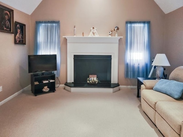 living room featuring lofted ceiling and carpet floors