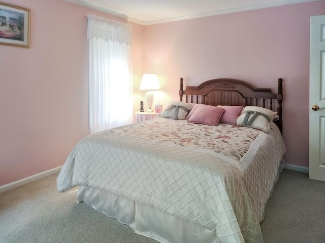 carpeted bedroom featuring crown molding