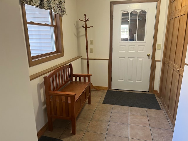 entrance foyer featuring light tile patterned flooring