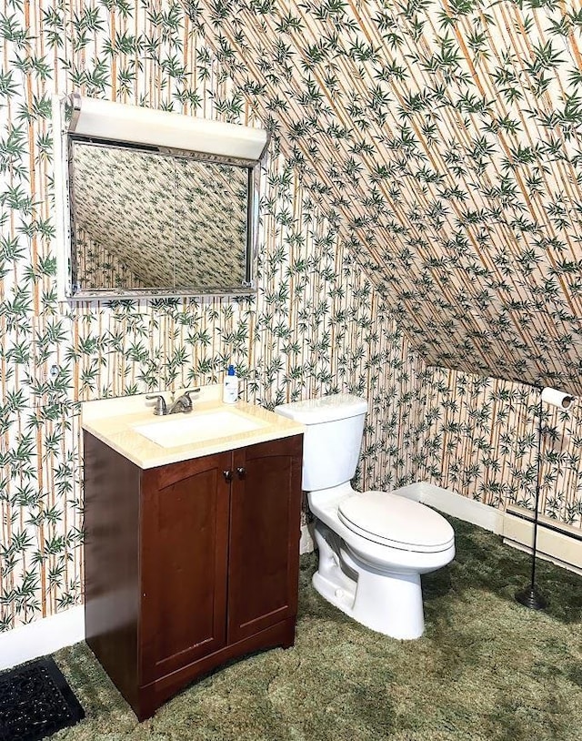 bedroom featuring wood-type flooring, wallpapered walls, vaulted ceiling, and baseboards