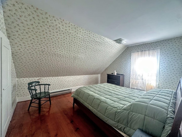 bonus room with baseboards, wood-type flooring, vaulted ceiling, and wallpapered walls