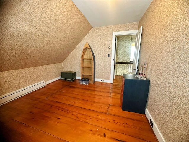unfinished below grade area with stairs and a heating unit