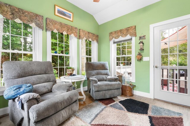 sunroom / solarium with lofted ceiling