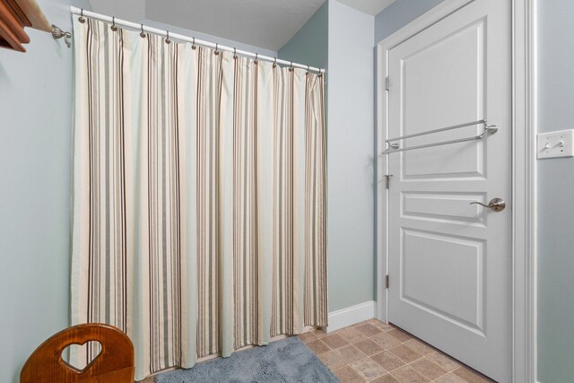 bathroom featuring tile patterned floors