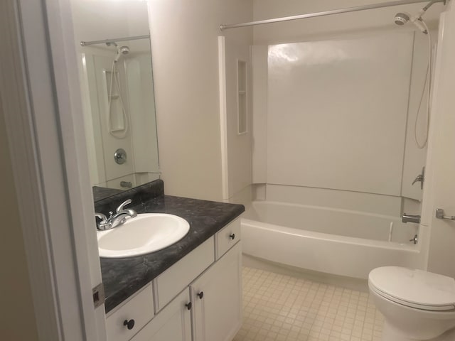 full bathroom featuring tile patterned floors, toilet, vanity, and  shower combination