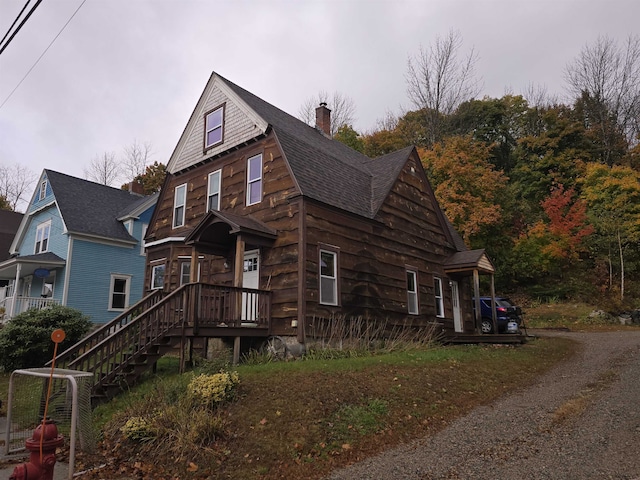 view of front of home featuring cooling unit