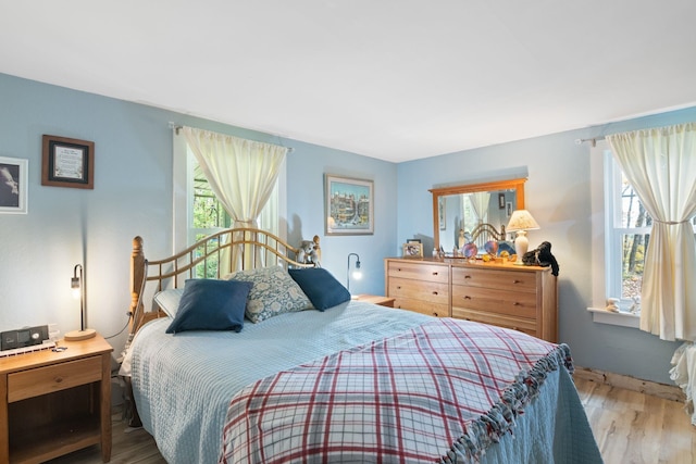 bedroom with light wood-type flooring