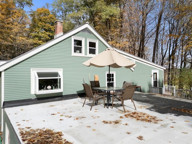 rear view of property featuring a patio