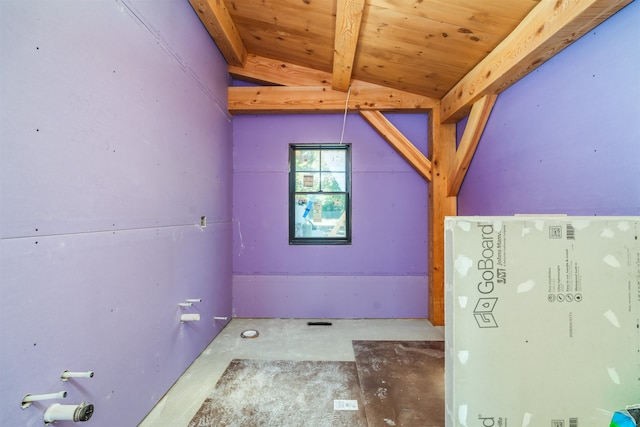 bathroom featuring wood ceiling and vaulted ceiling