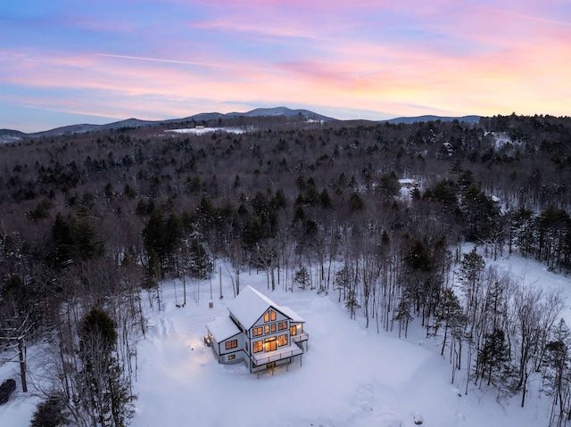 bird's eye view featuring a forest view