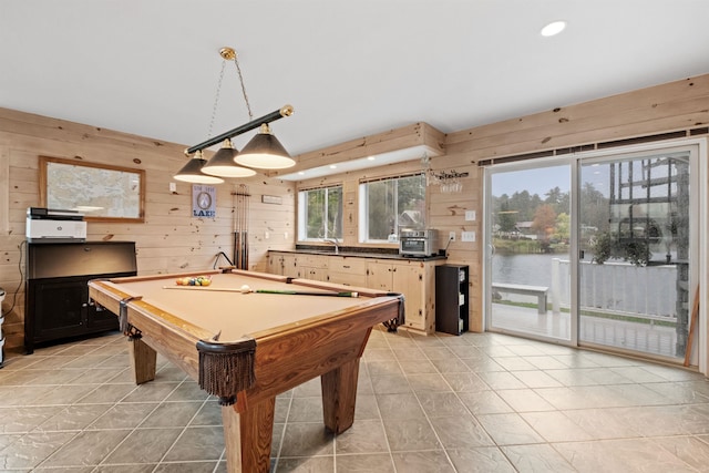 rec room featuring wooden walls, sink, and pool table