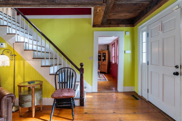 entrance foyer featuring hardwood / wood-style flooring